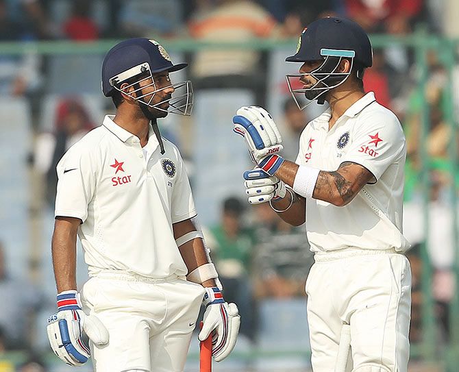  India's Ajinkya Rahane and Virat Kohli discuss strategy during the fourth Test against South Africa at the Ferozshah Kotla