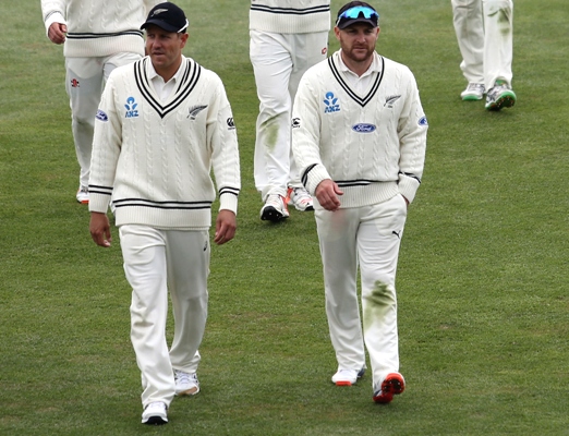 Brendon McCullum leads off the field in Dunedin 