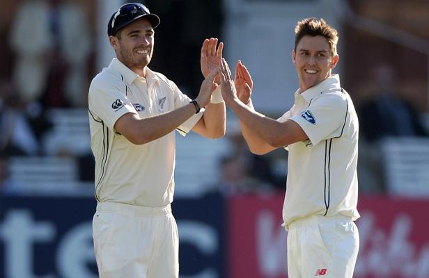 Trent Boult of New Zealand celebrates with Tim Southee  