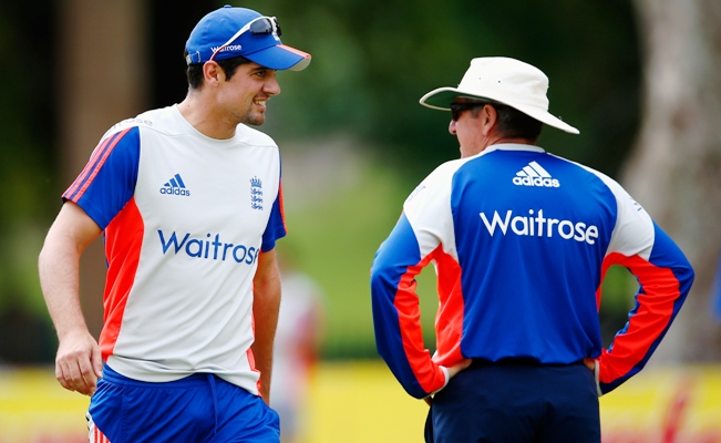 Coach Trevor Bayliss with Alastair Cook of England during a training session 
