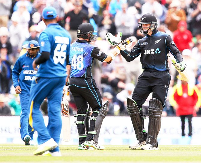 New Zealand's Tom Latham and Martin Guptill celebrate after defeating Sri Lanka in the second One-Day International at Hagley Oval in Christchurch on Monday