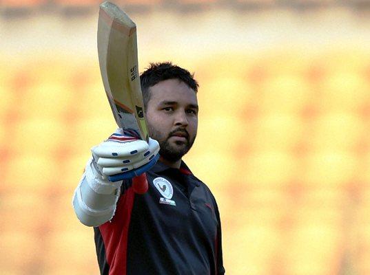 Gujarat skipper Parthiv Patel celebrates his century against Delhi 