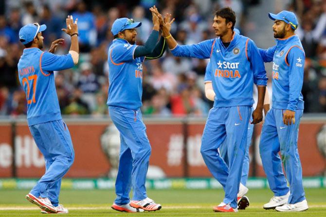 India players celebrate a wicket