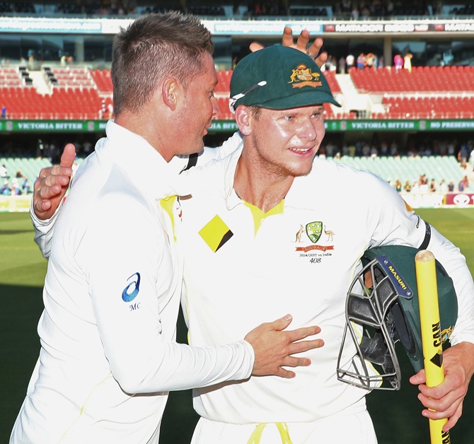 Michael Clarke of Australia congratulates Steven Smith