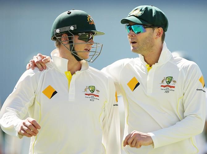 Michael Clarke, right, of Australia speaks to Steven Smith