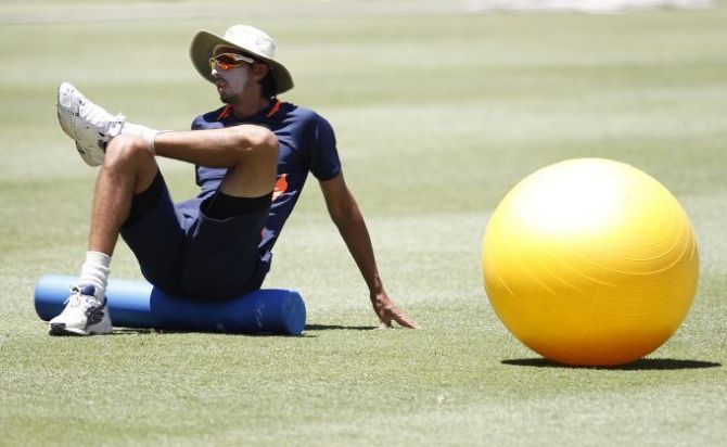 India's Ishant Sharma stretches during a practice session at the Sydney Cricket Ground