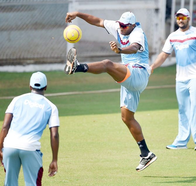 West Indies' players are seen during practice
