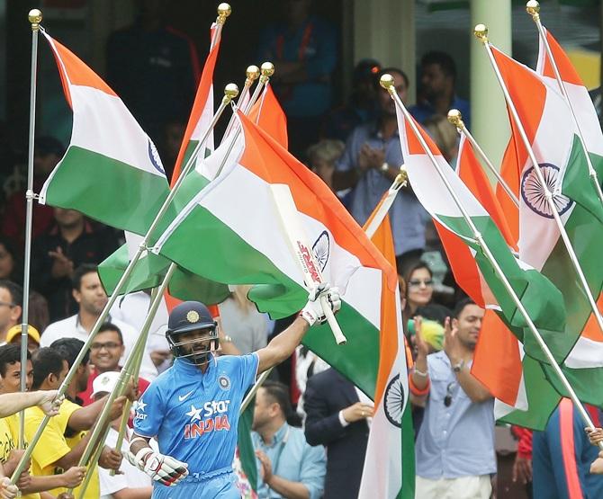 Shikhar Dhawan of India walks onto the field