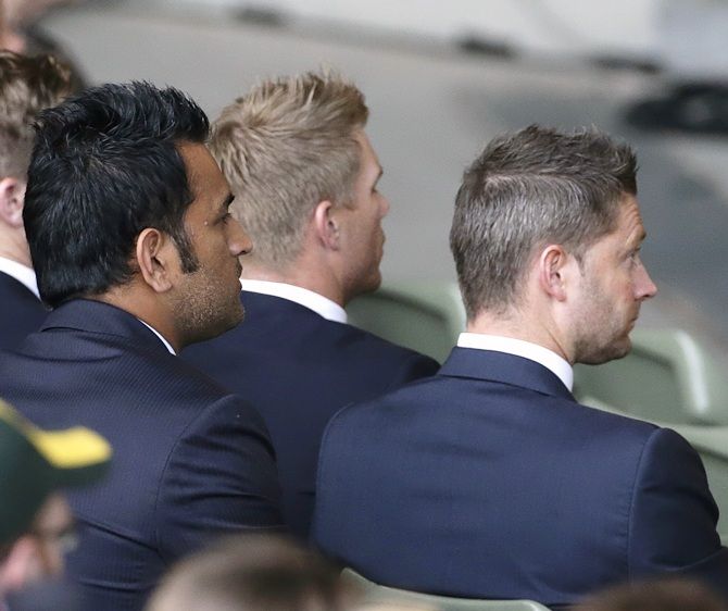 India's captain Mahendra Singh Dhoni, left, and Australia's captain Michael Clarke