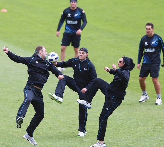 Daniel Vettori, Mitchell McClenaghan and Tim Southee 