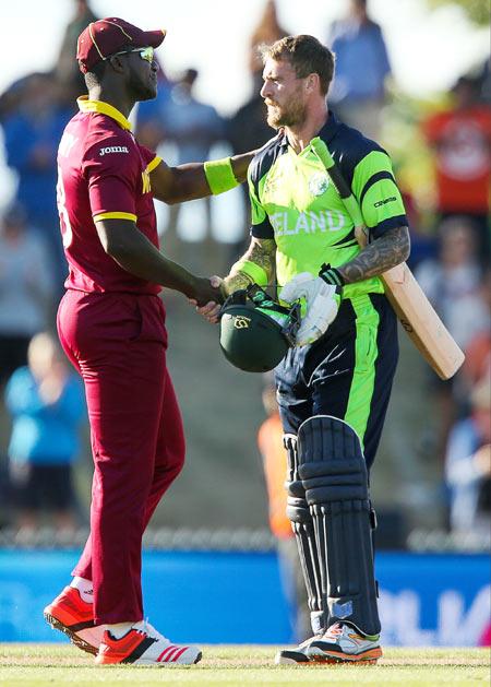 John Mooney of Ireland shakes hands with Darren Sammy of the West Indies 