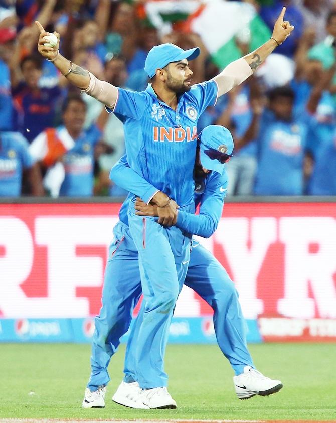 Virat Kohli celebrates