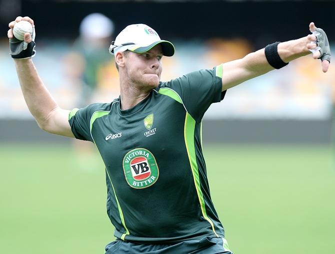 Steve Smith fields the ball during an Australian training session at The Gabba 