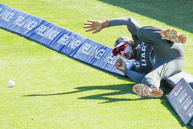 Amjad Ali of the United Arab Emirates fields the ball from the boundary during their match against Zimbabwe at Saxton Field in Nelson on February 19