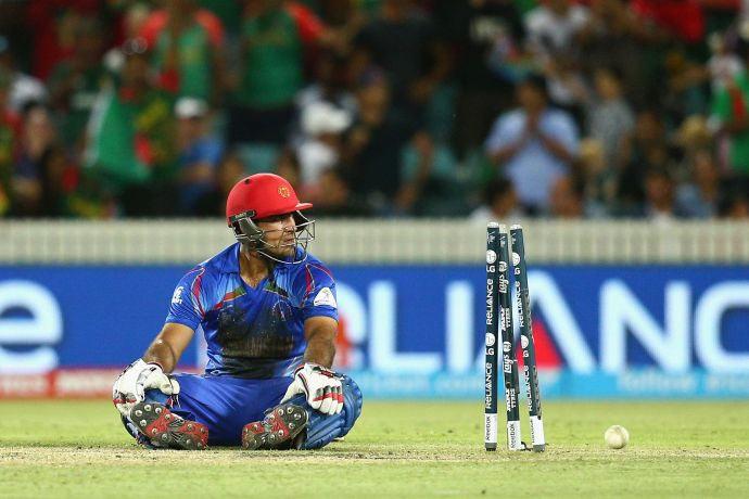 Samiullah Shinwari of Afghanistan wears a dejected look after being run-out during the World Cup match against Bangladesh on Wednesday