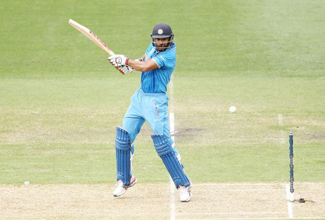 Shikhar Dhawan plays a cut shot