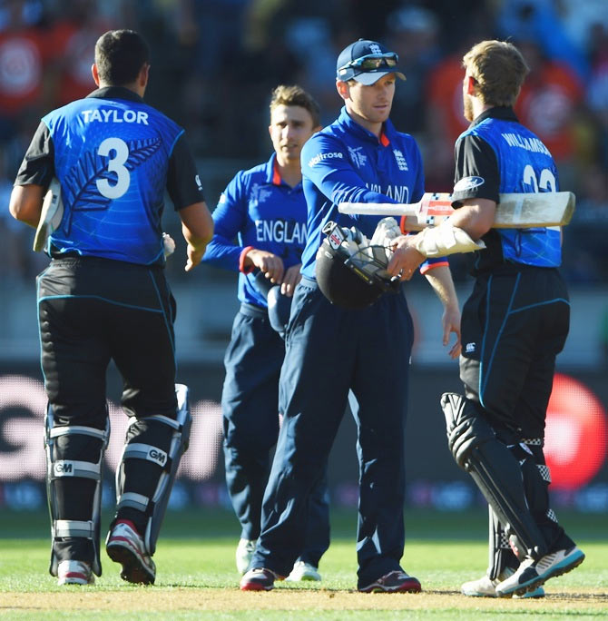 England captain Eoin Morgan congratulates Kane Williamson of New Zealand