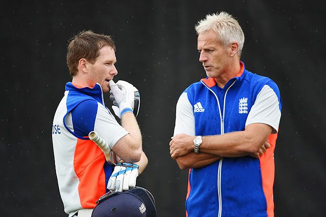 England coach Peter Moores talks with captain Eoin Morgan during an England nets session at Hagley Park Oval in Christchurch on Sunday