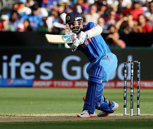 Indian player Ajinkya Rahane plays a shot on the off-side