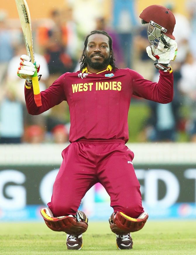 Chris Gayle of the West Indies celebrates his double century during the 2015 ICC Cricket World Cup match against Zimbabwe at Manuka Oval