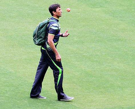 Younis Khan walks in for a practice session