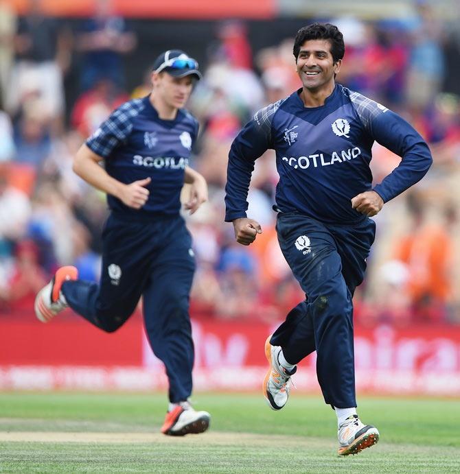 Majid Haq of Scotland celebrates