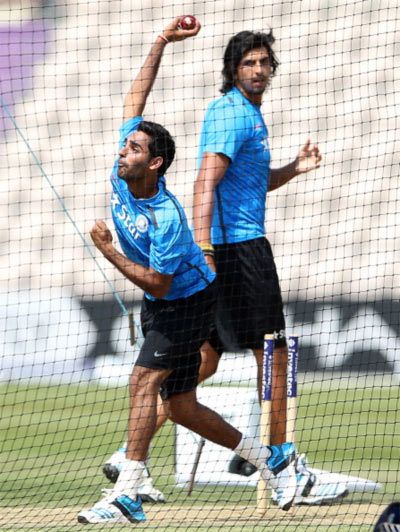 Image: Bhuvneshwar Kumar (left) in the nets as team mate Ishant Kumar looks on during the tour of England in July 201