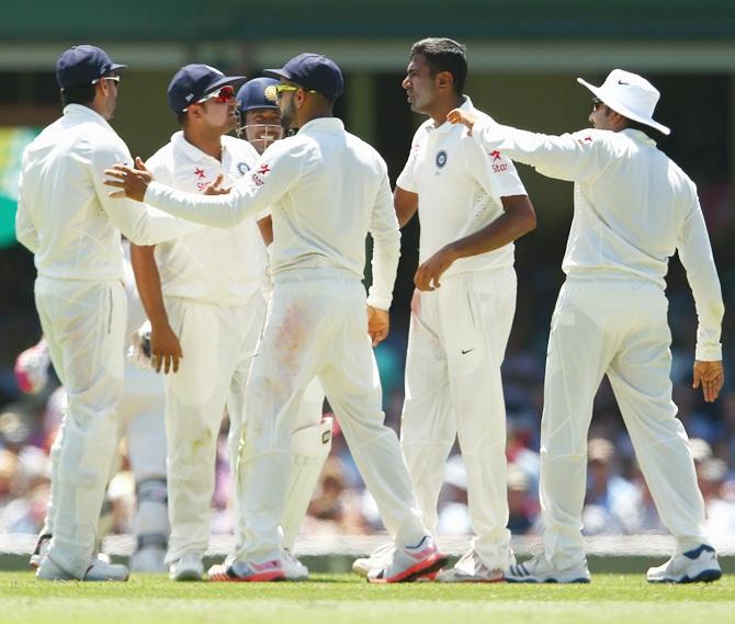 Ravichandran Ashwin of India celebrates with his team