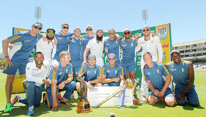The South Africa team celebrate winning the series with the ICC mace and a cheque of 500,000 US dollars after beating West Indies in the 3rd Test at Sahara Park Newlands in Cape Town on Tuesday