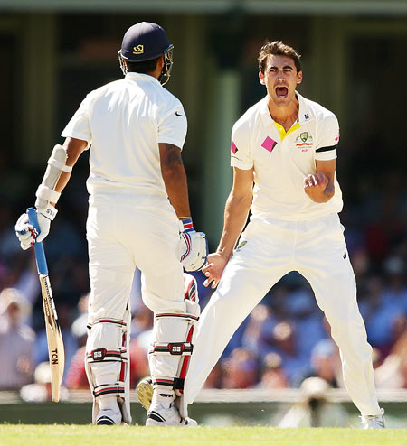 Mitchell Starc celebrates after taking the wicket of Murali Vijay India on Day 2 of the 4th Test at Sydney Cricket Ground on Wednesday