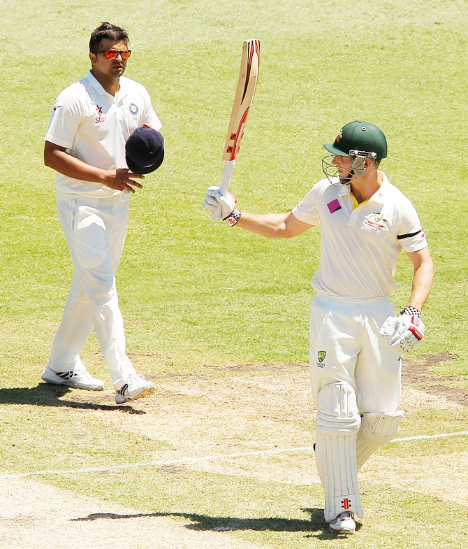 Shaun Marsh of Australia celebrates scoring his half century