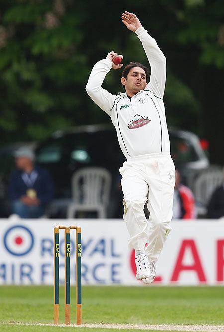 Saeed Ajmal of Worcestershire bowling 