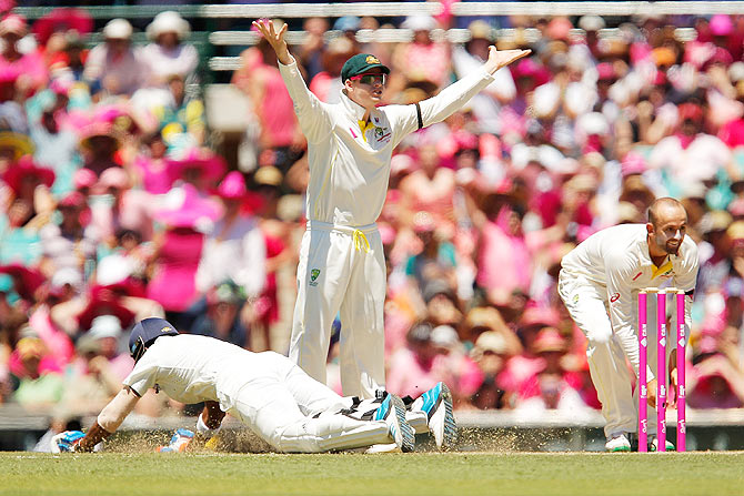 Steven Smith gestures as Lokesh Rahul of India runs to his crease during a run-out attempt