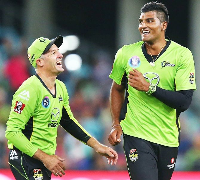 Gurinder Sandhu of the Thunder celebrates with team mate Michael Hussey