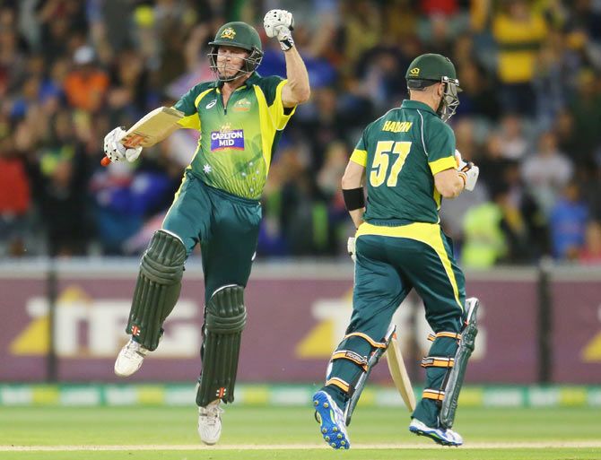 James Faulkner of Australia celebrates as he hits the winning runs during the 2nd One Day International against India during the tri-series at the Melbourne Cricket Ground on Sunday