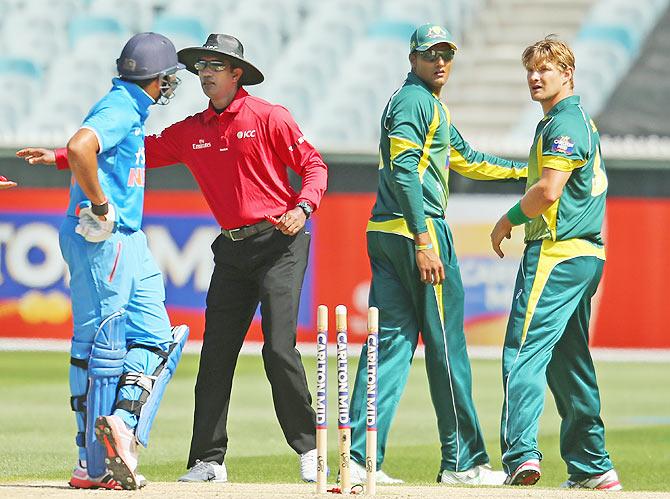 Shane Watson of Australia and Rohit Sharma of India exchange words after an overthrow during the One Day International match between Australia and India at the Melbourne Cricket Ground Sunday