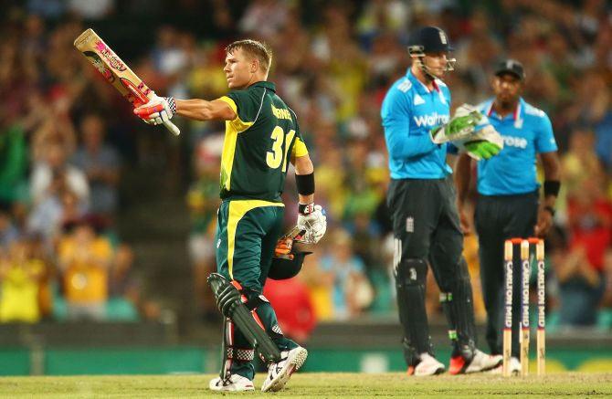 David Warner celebrates scoring a century