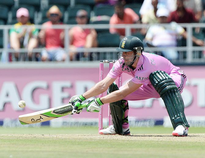 AB de Villiers of South Africa reverse sweeps a delivery enroute his record-breaking century during the 2nd ODI between South Africa and West Indies at Bidvest Wanderers Stadium in Johannesburg on Sunday