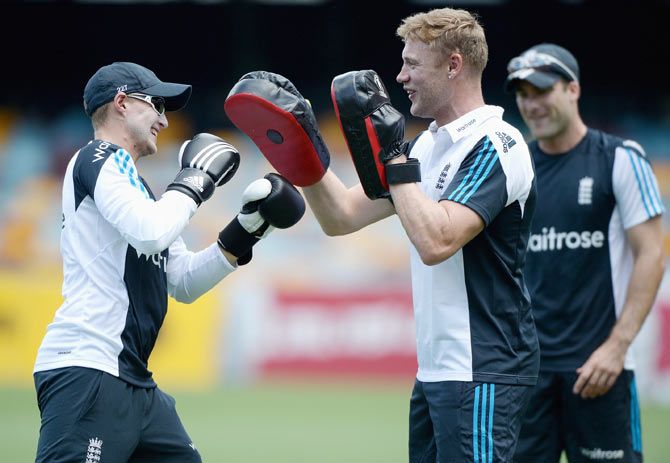 Former England cricketer Andrew Flintoff and England's batsman Joe Root in a sparring session ahead of a nets at The Gabba in Brisbane on Monday