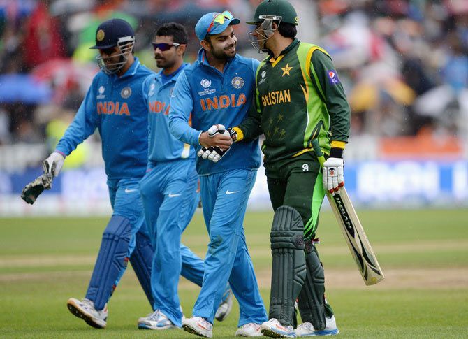 India's Virat Kohli congratulates Pakistan's Misbah-ul Haq during a match