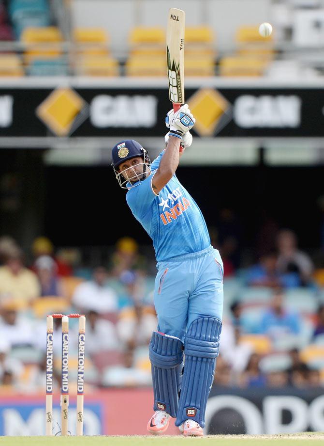 India's Stuart Binny attempts a big shot