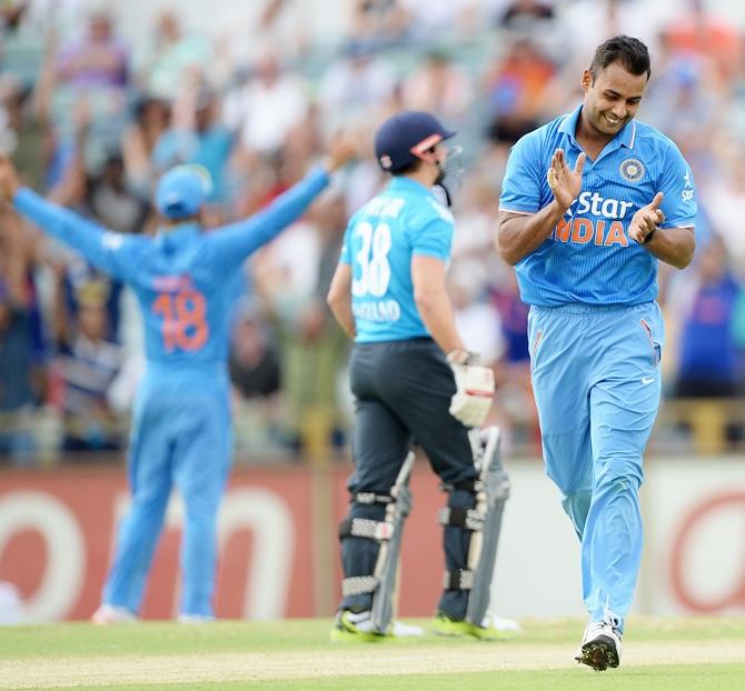 Stuart Binny of India celebrates dismissing Ravi Bopara of England