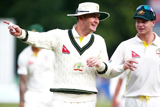 Australia's Michael Clarke and Steven Smith share a joke