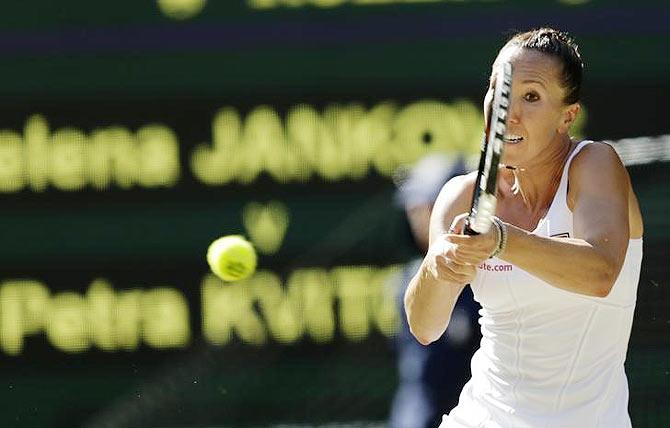 Jelena Jankovic hits a shot