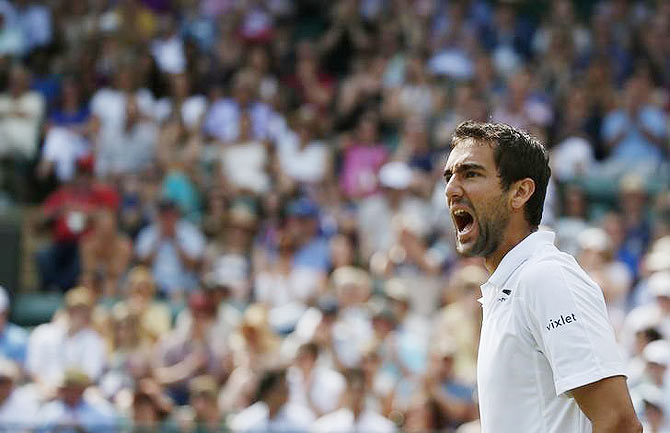 Marin Cilic celebrates victory over John Isner