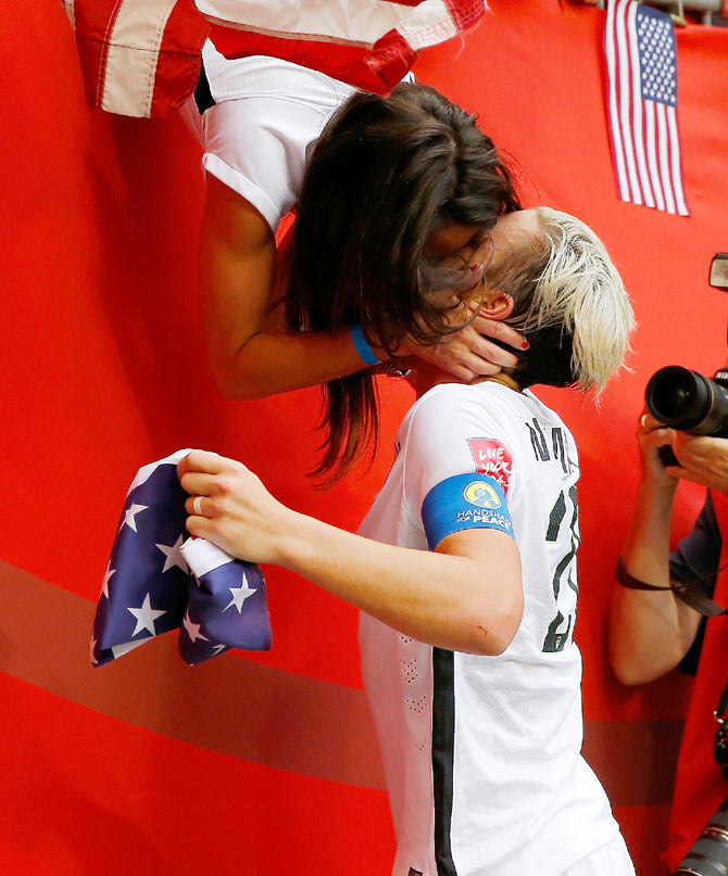 Abby Wambach of the United States celebrates with wife Sarah Huffman