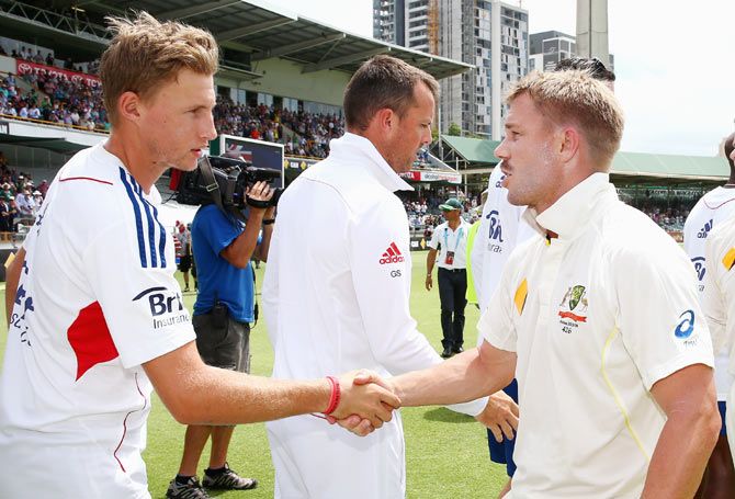 Australia's David Warner (right) shakes hands with Joe Root during day five of the Third Ashes Test Match between at WACA on December 17, 2013 in Perth