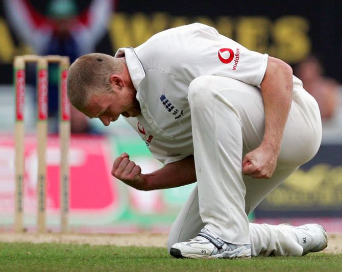 Andrew Flintoff celebrates the wicket of Shane Warne during the fifth Test at the Oval, on September 11, 2005