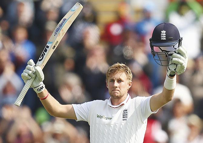 England's Joe Root celebrates his century on Day 1 of the 1st Ashes Test against Australia at SWALEC Stadium in Cardiff, on Wednesday