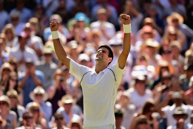 Serbia's Novak Djokovic celebrates after winning the Wimbledon semi-final match against France's Richard Gasquet